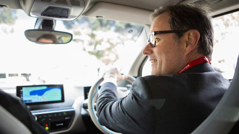 CEFC CEO Ian Learmouth test drives an EV