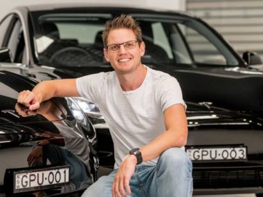 Daniel Rombouts with the new Tesla Model 3 rideshare cars. Supplied