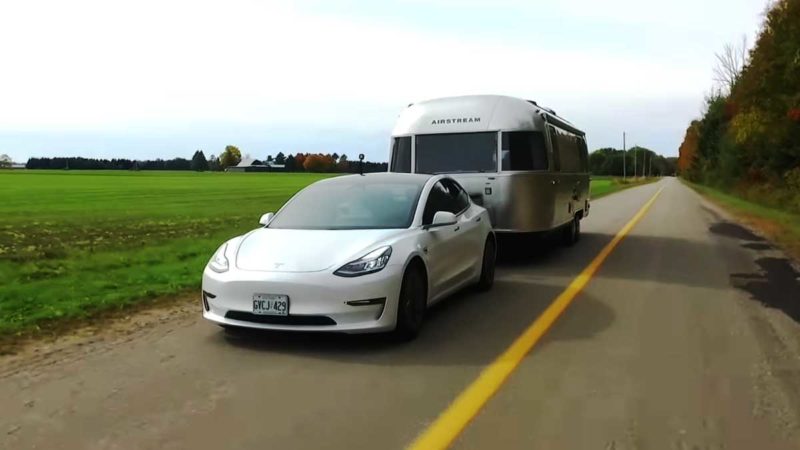 model 3 pulling airstream caravan