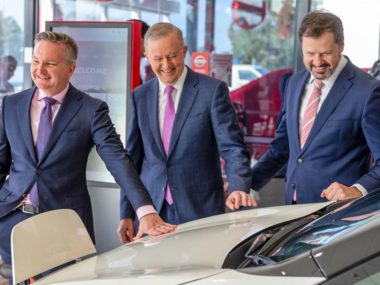 Federal Labor leader Anthony Albanese, Chris Bowen and Ed Husic visiting a Nissan Leaf electric car dealer