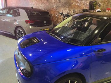 A VW ID.3 sits alongside a Honda e waiting for its owner