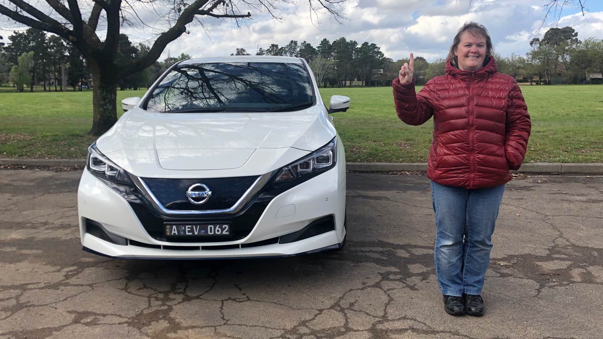 Karen Maher and Yuki the Nissan Leaf e+. Supplied