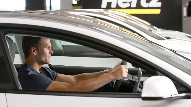 tom brady in a tesla