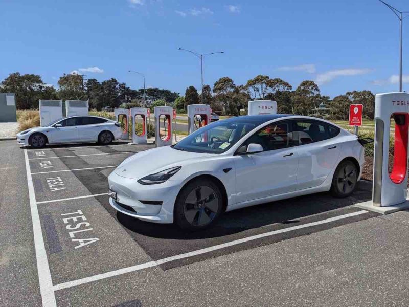 white tesla charging