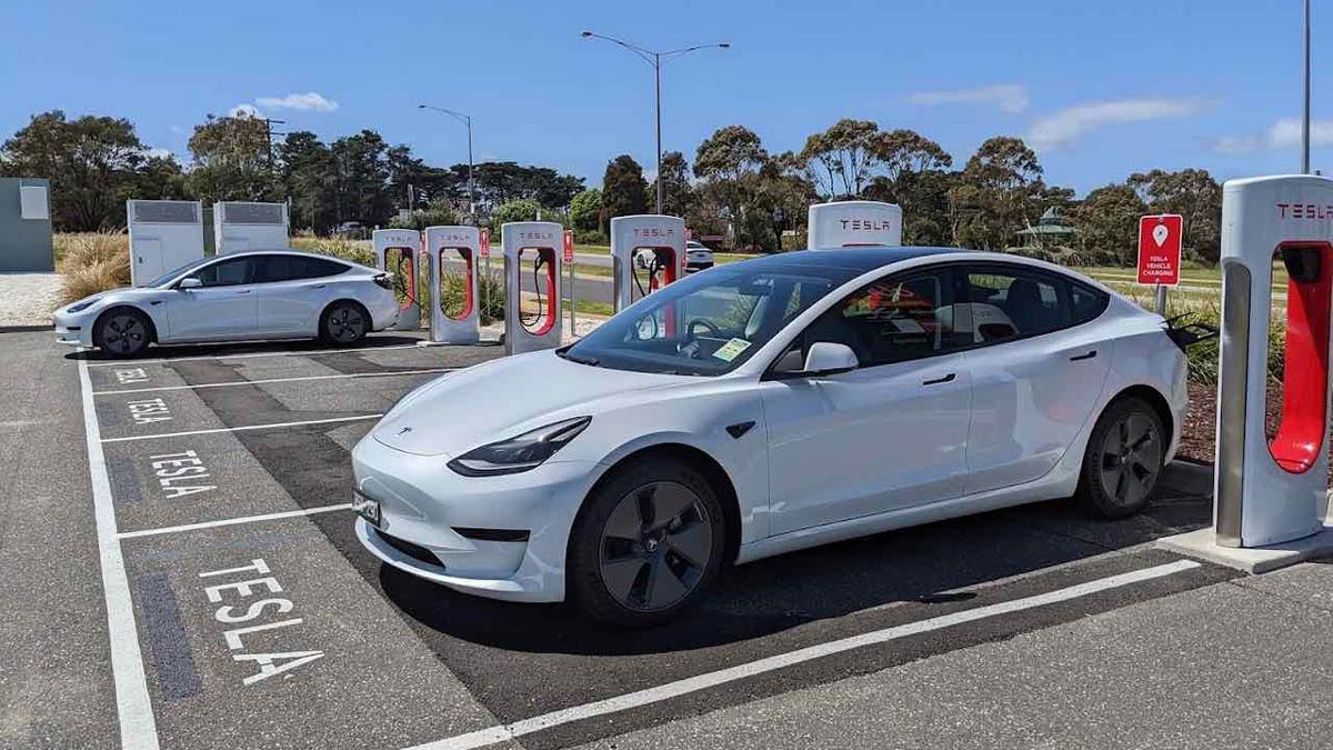 White Tesla charging. Image: Riz Akhtar