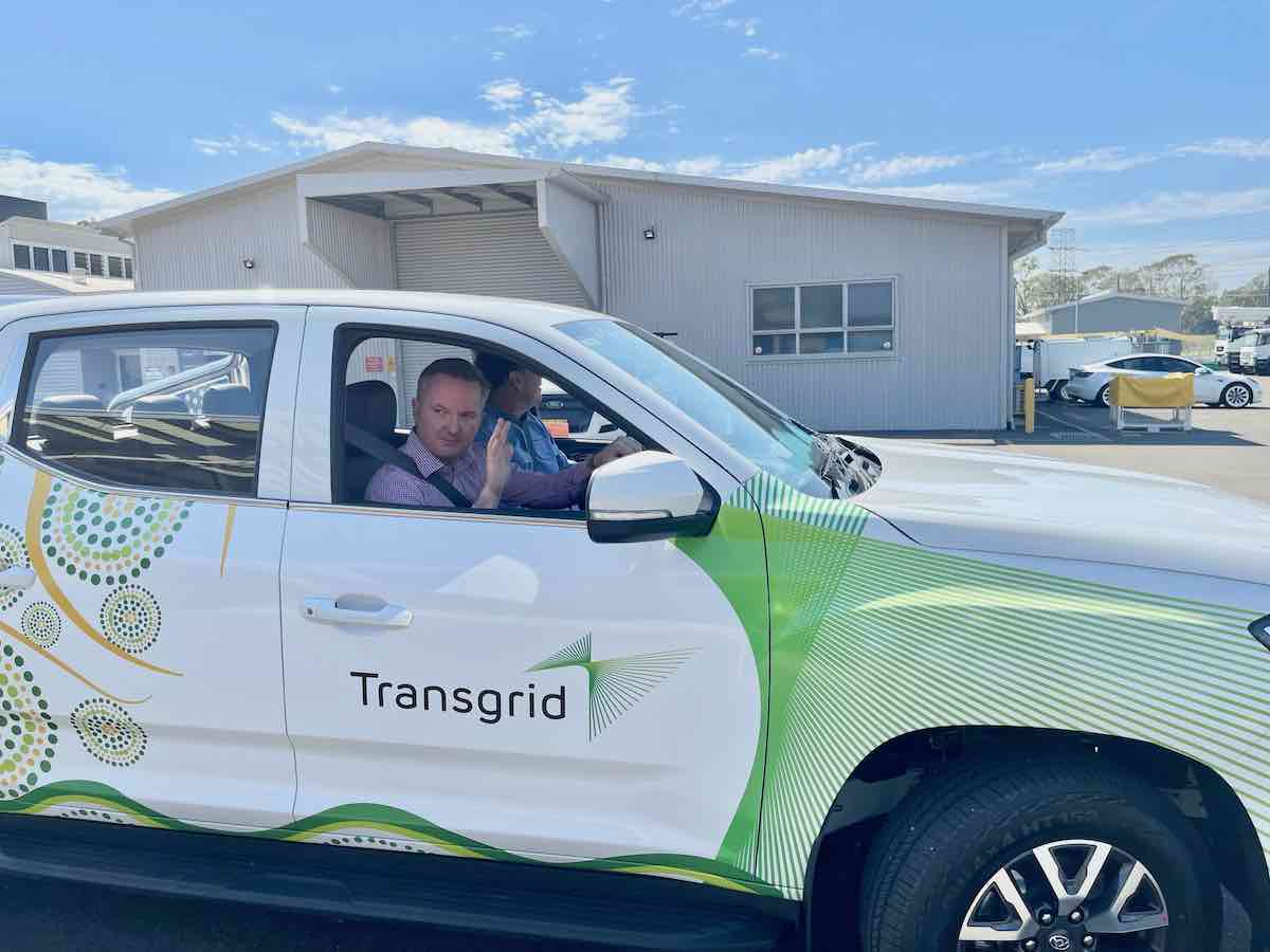 Federal Minister for Climate Change and Energy Chris Bowen test drives Transgrid's new all-electric ute