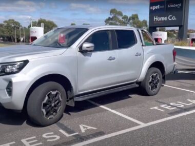 Ute with boat blocks 4 Tesla Superchargers for over 3 hours