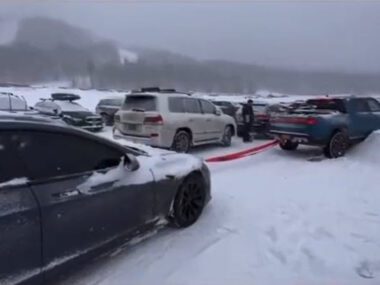 Tesla Towing Rivian R1T