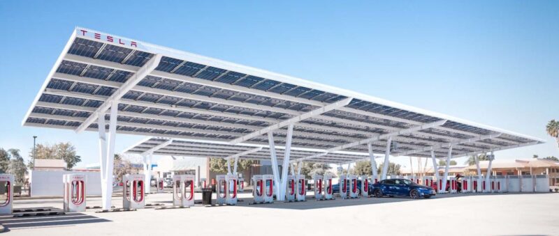 Tesla Supercharging station with solar roof