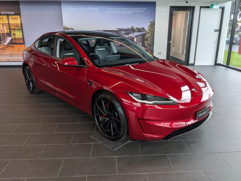 New Tesla Model 3 Performance in Ultra Red on display at Tesla Miranda. Image: Tim Eden