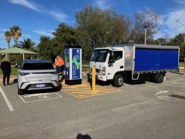 The BYD Dolphin charging at Jurien Bay with the Mighty electric truck.