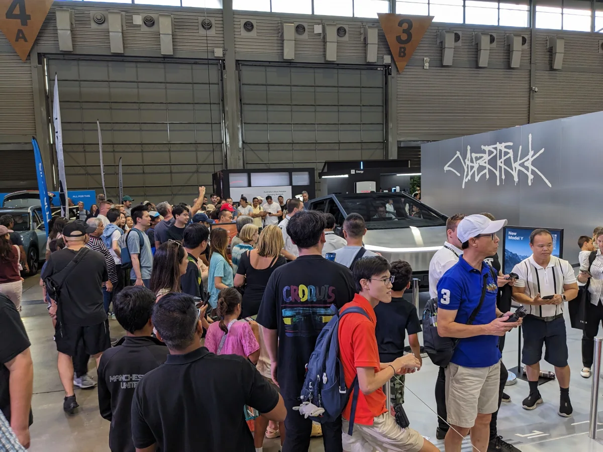 Crowds gathered at the Tesla stand, lining up to experience the Cybertruck. Image: Tim Eden
