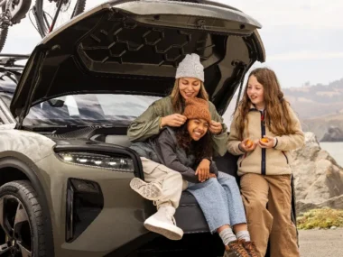 Lucid Gravity frunk, with people enjoying the frunk seat. Source: Lucid Motors