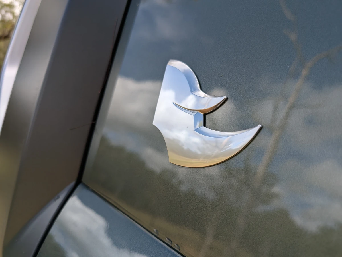 Rhinoceros logo on the Musso EV. Source: Tim Eden