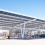 Tesla Supercharging station with solar roof